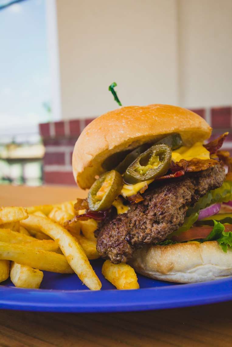 Stacked burger with fries