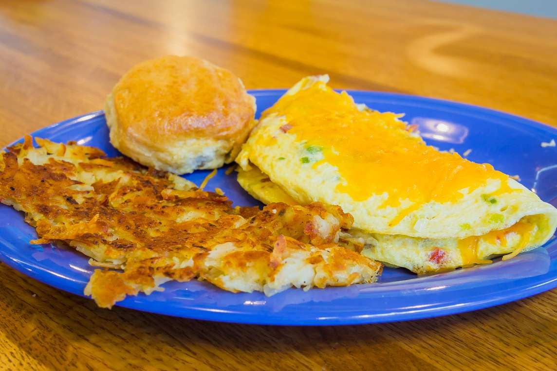 Omelet, hash browns and biscuit